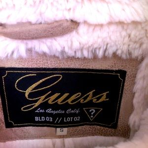 Guess, size SM, color natural with faux-fur inside.